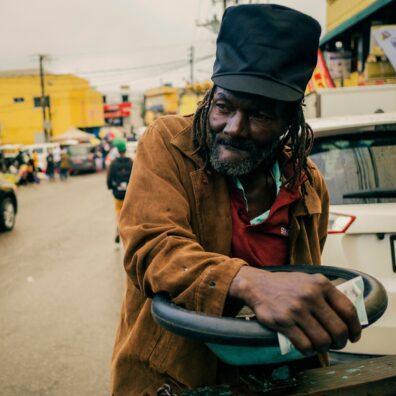 Rastaman with a Rastafari Crown Dreadlock Hat Rasta Cap